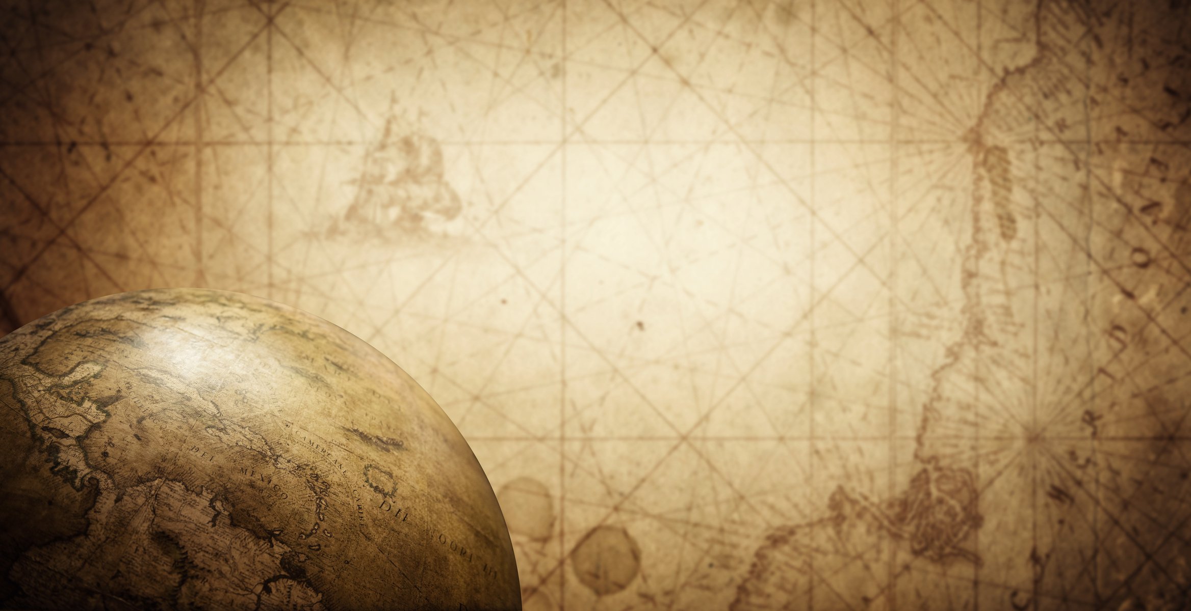 Ancient old globe on the vintage map background.